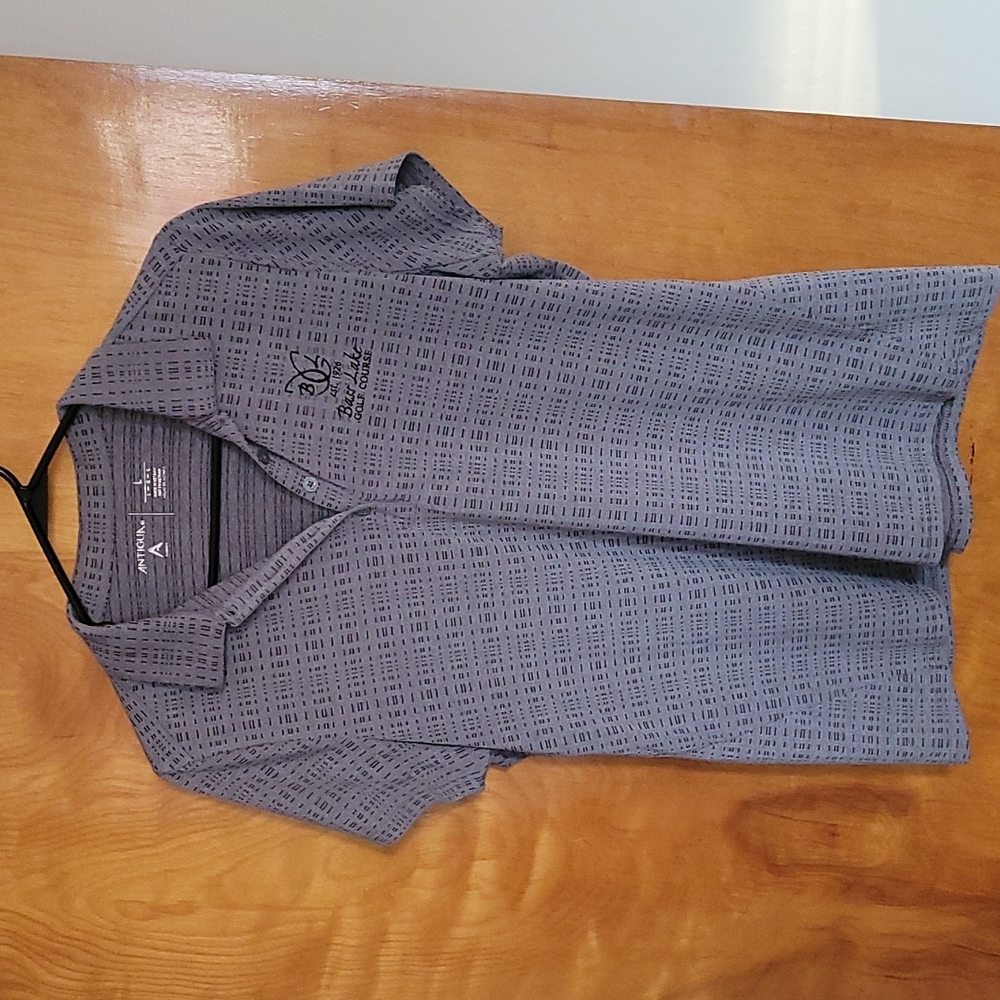 Antigua golf shirt . Women's size large